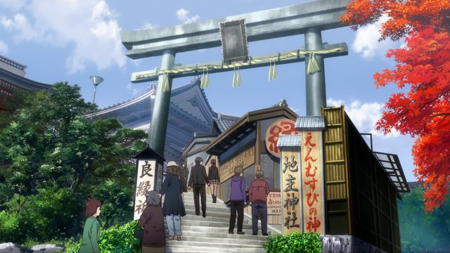 Love talk in front of the red torii